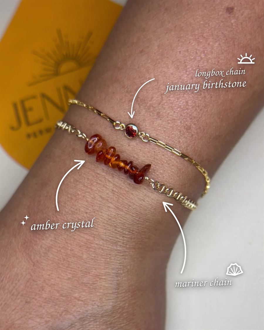 A gold bracelet threaded with amber crystal chips.